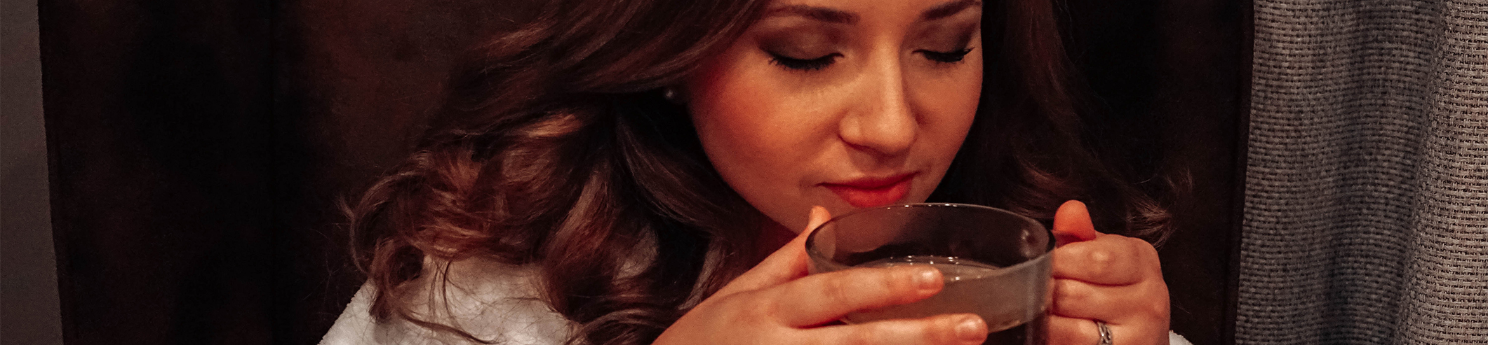 Woman drinking tea and relaxing at Serendipity